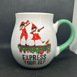Express your Elf Christmas mug holds 16 ounces
